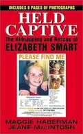 Book cover of Held captive