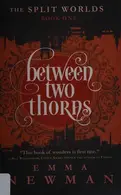 Book cover of Between two thorns