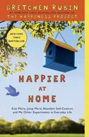 Book cover of Happier at home: kiss more, jump more, abandon a project, read Samuel Johnson, and my other experiments in the practice of everyday life