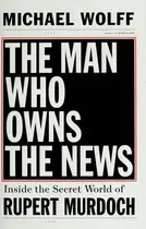 Book cover of The man who owns the news
