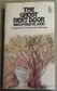 Book cover of The Ghost Next Door