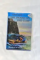Book cover of The House on the Cliff