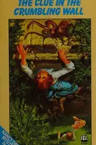 Book cover of The clue in the crumbling wall