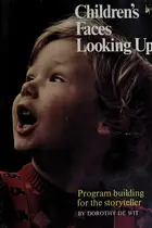 Book cover of Children's faces looking up