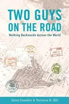 Book cover of Two Guys On The Road Walking Backwards Across The World