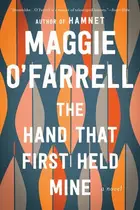 Book cover of The Hand That First Held Mine