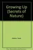 Book cover of Growing Up (Secrets of Nature)