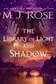Book cover of The library of light and shadow