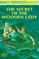 Book cover of The Secret of the Wooden Lady