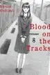 Book cover of Blood on the Tracks 8